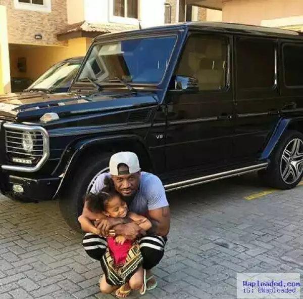Photo: Peter Okoye A.k.a Mr P.  With His Daughter In Front Of His G-Wagon